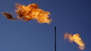 Environment Minister Steven Guilbeault says the controlled release or burning of methane from oil and gas production sites will be almost entirely barred by 2030. Flares burn off methane and other hydrocarbons at an oil and gas facility in Lenorah, Texas, Friday, Oct. 15, 2021. THE CANADIAN PRESS/AP — David Goldman