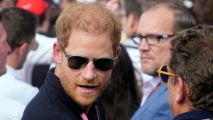 Prince Harry, The Duke of Sussex, attends the Formula One U.S. Grand Prix auto race at Circuit of the Americas, Sunday, Oct. 22, 2023, in Austin, Texas. (AP Photo/Darron Cummings) 