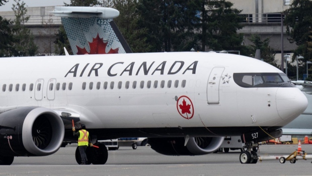 An Air Canada aircraft can be seen above. THE CANADIAN PRESS/Adrian Wyld