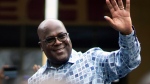 Congo's President Felix Tshisekedi waves to his supporters after casting his ballot inside a polling station during the presidential elections in Kinshasa, Democratic Republic of Congo, Wednesday, Dec. 20, 2023. (AP Photo/Mosa'ab Elshamy, File)
