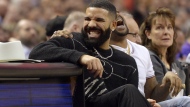 Performer Drake has a laugh courtside during first half NBA basketball action between the Toronto Raptors and the Milwaukee Bucks, in Toronto, Tuesday, Feb. 25, 2020. UFC president Dana White reposted a betting slip from Drake's verified Instagram account showing the Toronto rapper has wagered $700,000 on Strickland to beat South African challenger Dricus (Stillknocks) Du Plessis. The estimated payout is $1.379 million. THE CANADIAN PRESS/Nathan Denette