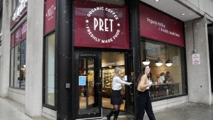 People leave the Pret A Manger store front in Toronto, Tuesday, Jan. 23, 2024. The U.K. cafe chain with hundreds of international locations opened its first store front location in Canada, located in Toronto's financial district. THE CANADIAN PRESS/Nathan Denette
