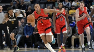 Toronto Raptors forward Scottie Barnes (4) brings the ball up during the second half of the team's NBA basketball game against the Memphis Grizzlies on Wednesday, Jan. 3, 2024, in Memphis, Tenn. A new-look Toronto Raptors team means turning a three-day break into a mini-training camp. THE CANADIAN PRESS/AP, Brandon Dill