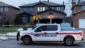 Yellow police tape cordons off a home where a police investigation is underway in Richmond Hill Thursday, February 1, 2024. (Jacob Estrin)