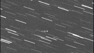 This image provided by Virtual Telescope Project out of Italy shows a single 180-second exposure asteroid that was approaching Earth, about 4 million kilometers, Thursday, Jan. 31, 2024. Astronomers say an asteroid as big as a skyscraper will pass within 1.7 million miles of Earth on Friday. There's no chance of it hitting us since it will pass seven times the distance from Earth to the moon. (Virtual Telescope Project via AP)
