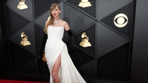 Taylor Swift arrives at the 66th annual Grammy Awards on Sunday, Feb. 4, 2024, in Los Angeles. (Photo by Jordan Strauss/Invision/AP)