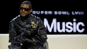 Usher speaks during a news conference ahead of the Super Bowl 58 NFL football game Thursday, Feb. 8, 2024, in Las Vegas. Usher will perform during the Super Bowl halftime show. (AP Photo/John Locher)