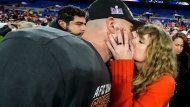 Taylor Swift kisses Kansas City Chiefs tight end Travis Kelce after an AFC Championship NFL football game against the Baltimore Ravens, Sunday, Jan. 28, 2024, in Baltimore. She won't be in uniform or on the field but Swift will certainly be a part of the Ontario sports betting's Super Bowl landscape. She is scheduled to be in Las Vegas on Sunday when Kansas City chases a second straight Super Bowl title versus the San Francisco 49ers.THE CANADIAN PRESS/AP-Julio Cortez