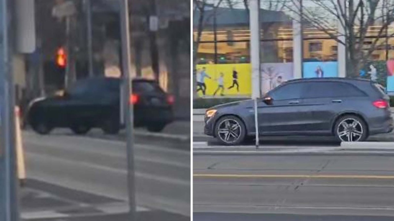 An SUV is seen driving along a separated bike lane near Dundas and Sumach streets on Saturday, Feb. 10, 2024. (Video submitted by David Shellnutt) 
