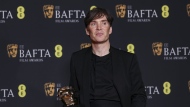 Cillian Murphy, winner of the leading actor award for 'Oppenheimer', poses for photographers at the 77th British Academy Film Awards, BAFTA's, in London, Sunday, Feb. 18, 2024. (Photo by Vianney Le Caer/Invision/AP)