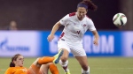 Canadian Carmelina Moscato has joined the NWSL's Racing Louisville FC as an assistant coach. Moscato battles Netherlands' Danielle Van De Donk during first-half Women's World Cup soccer in Montreal, Monday, June 15, 2015. THE CANADIAN PRESS/Ryan Remiorz