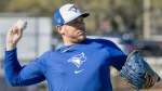 Toronto Blue Jays pitcher Yariel Rodriguez throws in a drill during Spring Training action in Dunedin, Fla. on Monday February 19, 2024.THE CANADIAN PRESS/Frank Gunn