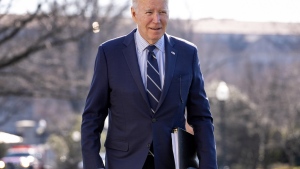 U.S. President Joe Biden walks toward members of the media as he arrives at the White House in Washington, Monday, Feb. 19, 2024, after returning from Rehoboth Beach, Del. (AP Photo/Andrew Harnik)