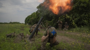 Ukrainian soldiers fire towards Russian positions on the frontline in Zaporizhzhia region, Ukraine, Saturday, June 24, 2023. Significantly more Canadians want the federal government to send more ammunition and other military supplies to aid in its war against the Russian invasion compared to last fall, the results of a new poll by Leger suggested Thursday. THE CANADIAN PRESS/AP, Efrem Lukatsky
