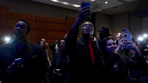 Members of the audience cheers as Republican presidential candidate former President Donald Trump arrives at the Black Conservative Federation's Annual BCF Honors Gala at the Columbia Metropolitan Convention Center in Columbia, S.C., Friday, Feb. 23, 2024. (AP Photo/Andrew Harnik)