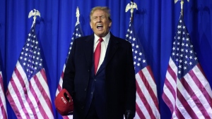 Republican presidential candidate former U.S. president Donald Trump yells on stage at a campaign rally in Waterford Township, Mich., Feb. 17, 2024. In Michigan's presidential primary on Tuesday, Feb. 27, Trump is looking for another win that would add to his sweep of the early-voting states. The Michigan contest is the final major race before the primary broadens dramatically on Super Tuesday, when more than a dozen states will hold elections on Mar. 5 with thousands of delegates at stake. (AP Photo/Paul Sancya, File)