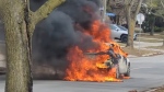 A vehicle is seen engulfed in flames in North York on Feb. 25, 2024 in this image. (Submitted)