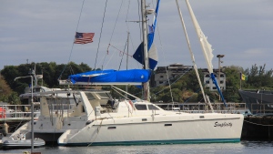 The yacht "Simplicity", in which officials say was hijacked by three escaped prisoners with two people aboard, is docked at the St. Vincent and the Grenadines Coastguard Service Calliaqua Base, in Calliaqua, St. Vincent, Friday, Feb. 23, 2024. Authorities in the eastern Caribbean said they were trying to locate two people believed to be U.S. citizens who were aboard the yacht that was hijacked by the three escaped prisoners from Grenada. (AP Photo/Kenton X. Chance)