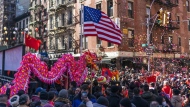 Revelers take part during the Chinese New Year "The Dragon" parade in the Chinatown neighborhood of Manhattan, Sunday, Feb. 25, 2024, in New York. (AP Photo/Eduardo Munoz Alvarez)