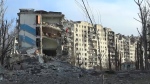 This photo taken from video released by the head of the Russian-controlled Donetsk region Denis Pushilin's telegram channel shows damaged buildings, after Russian forces completed their takeover of Avdiivka, eastern Ukraine on Saturday, Feb. 24, 2024. (Head of the Russian-controlled Donetsk region Denis Pushilin telegram channel via AP)