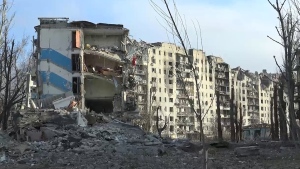 This photo taken from video released by the head of the Russian-controlled Donetsk region Denis Pushilin's telegram channel shows damaged buildings, after Russian forces completed their takeover of Avdiivka, eastern Ukraine on Saturday, Feb. 24, 2024. (Head of the Russian-controlled Donetsk region Denis Pushilin telegram channel via AP)