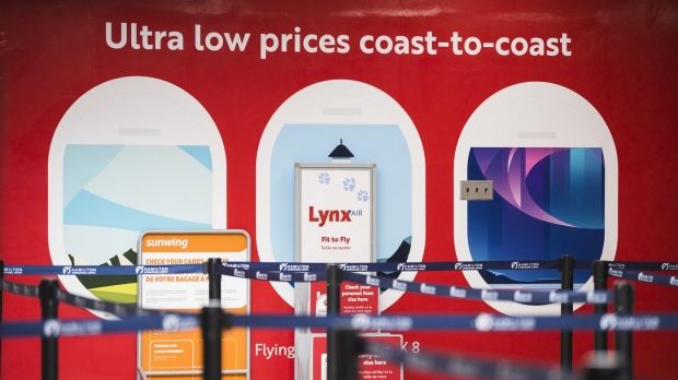 Lynx Air ceased to fly this week, the latest in a long line of discount carriers to bite the departures dust — brought down in part by stiff competition, high fees and Canada’s vast geography. Lynx Air signage is displayed at the John C. Munro Hamilton International Airport in Hamilton, Ont., Friday, February 23, 2024. (THE CANADIAN PRESS/Nick Iwanyshyn)
