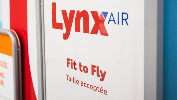 Lynx Air signage is displayed at the John C. Munro Hamilton International Airport in Hamilton, Ont., Friday, February 23, 2024. THE CANADIAN PRESS/Nick Iwanyshyn 
