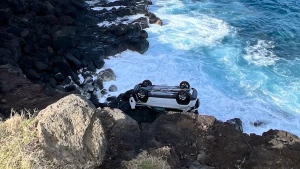 A rented Jeep driven by a Canadian tourist is overturned after falling down a cliff on Hawaii's Big Island on Feb 25. 2024. (Source: Kau Auto Repair and Towing/CNN)