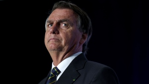 Far-right former Brazilian President Jair Bolsonaro speaks during the Turning Point USA event at the Trump National Doral Miami resort in February 2023, in Florida. (Joe Raedle / Getty Images via CNN Newsource)