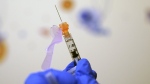 FILE - A child's dose of the COVID-19 vaccination is shown, Wednesday, Nov. 3, 2021, at Children's National Hospital in Washington. THE CANADIAN PRESS/AP/Carolyn Kaster
