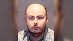 Tyler Pennells, 26, of Etobicoke, has been arrested and charged in connection with an online luring investigation. (TPS photo)