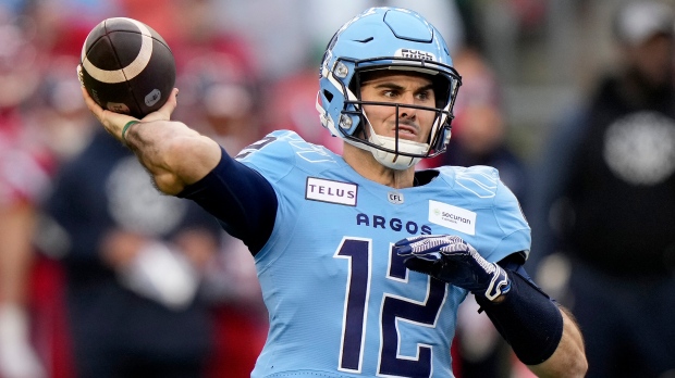 Toronto Argonauts quarterback Chad Kelly (12) makes the pass during first half CFL Eastern Division final football action against the Montreal Alouettes, in Toronto, Saturday, Nov. 11, 2023. THE CANADIAN PRESS/Frank Gunn 