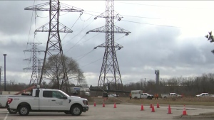 Hydro crews trying to restore power to thousands of customers in Toronto on Wednesday, Feb. 28, 2024.
