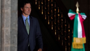 Canadian Primer Minister Justin Trudeau smiles upon his arrival for an agreement signing ceremony with Mexico's President Andrés Manuel López Obrador at the National Palace in Mexico City, Wednesday, Jan. 11, 2023. (Fernando Llano / AP Photo)