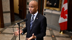 Minister of International Development Ahmed Hussen speaks in the Foyer of the House of Commons before Question Period on Parliament Hill in Ottawa, Thursday, Feb. 15, 2024. THE CANADIAN PRESS/Justin Tang 