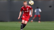 Toronto FC's Matty Longstaff eyes the ball during a preseason game against Los Angeles FC in Los Angeles in a Feb.17, 2024 handout photo. Toronto FC has signed former England youth international Longstaff to a two-year contract with an option for 2026. THE CANADIAN PRESS/HO-Toronto FC-Raul Romero Jr. **MANDATORY CREDIT**