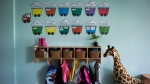 Children's backpacks and shoes are seen at a daycare in Langley, B.C., on May 29, 2018. Legislation that commits the federal government to long-term funding of the national child-care system is poised to become law. THE CANADIAN PRESS/Darryl Dyck