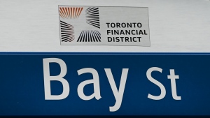 A street sign along Bay Street in Toronto's financial district in Toronto on Tuesday, January 12, 2021. People should check the credentials of the person they are seeking financial advice from, Ontario’s financial services regulator's latest education campaign says. THE CANADIAN PRESS/Nathan Denette
