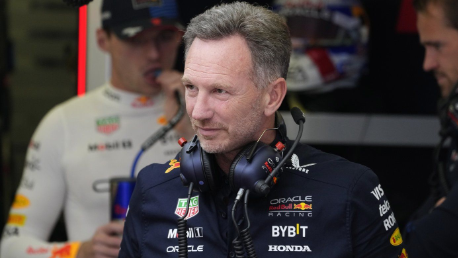 Red Bull team principal Christian Horner stands in his team garage during the third practice session ahead of the Formula One Bahrain Grand Prix at the Bahrain International Circuit in Sakhir, Bahrain, Friday, March 1, 2024. (AP Photo/Darko Bandic)