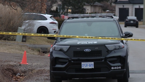 A police car is seen parked amid an SIU investigation in Halton on March 2, 2024. (Jacob Estrin / CP24)