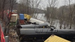 This photo provided by Nancy Run Fire Company shows a train derailment along a riverbank in Saucon Township, Pa., on Saturday, March 2, 2024. (Nancy Run Fire Company/AP)