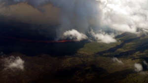 In this photo released by Galapagos National Park, La Cumbre volcano erupts in Fernandina Island, in the Galapagos islands, Ecuador, Saturday, April 11, 2009 (AP Photo/Galapagos National Park) 