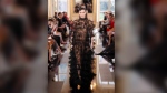 Vittoria Ceretti wears a creation as part of the Valentino Fall/Winter 2024-2025 ready-to-wear collection presented Sunday, March 3, 2024 in Paris. (Photo by Vianney Le Caer/Invision/AP)