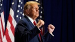 Republican presidential candidate former President Donald Trump gestures at a campaign rally Saturday, March 2, 2024, in Richmond, Va. (AP Photo/Steve Helber)