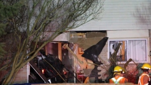 A car is pictured inside a home where it crashed in Ajax Sunday March 3, 2024. 