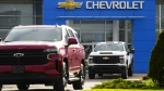 A Chevrolet vehicle logo is pictured on a car at an automotive dealership in Ottawa on Friday, Aug. 11, 2023. THE CANADIAN PRESS/Sean Kilpatrick