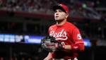 Cincinnati Reds first baseman Joey Votto heads to the dugout after during the middle of the eighth inning of a baseball game against the Toronto Blue Jays, Saturday, Aug. 19, 2023, in Cincinnati. (AP Photo/Joshua A. Bickel)