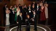 The cast and crew of 'Oppenheimer' accept the award for best picture during the Oscars on Sunday, March 10, 2024, at the Dolby Theatre in Los Angeles. (AP Photo/Chris Pizzello)