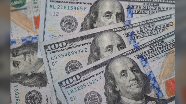 likeness of Benjamin Franklin on $100 bills