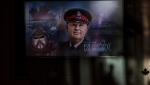 The face of Toronto Police officer Jeffrey Northrup is seen on a plasma screen at his funeral service, in Toronto on July 12, 2021. Jury selection is expected to begin today in the trial of a man accused of killing a Toronto police officer nearly three years ago. Umar Zameer is charged with first-degree murder in the the death of Const. Jeffrey Northrup. THE CANADIAN PRESS/Chris Young
